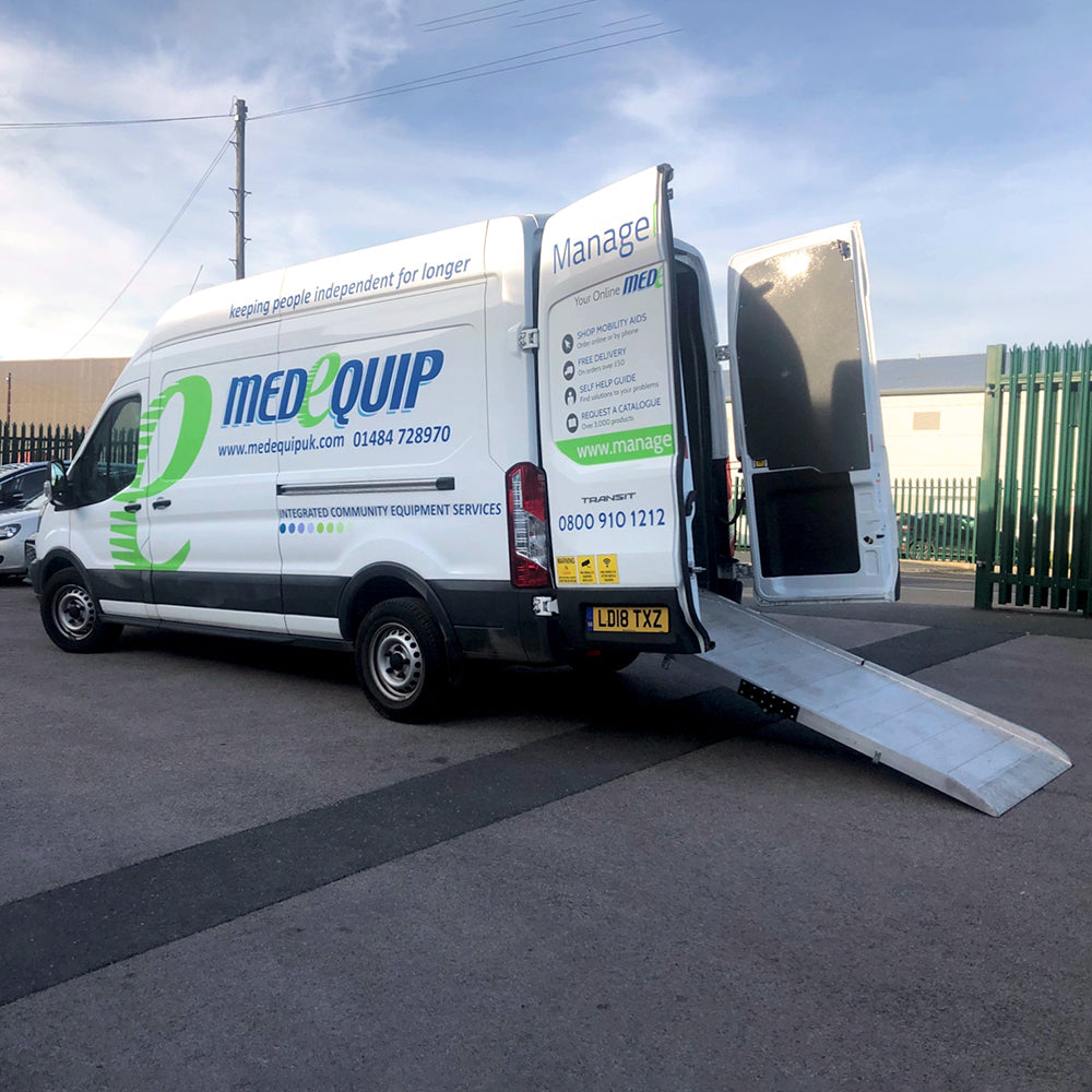 Picture of a folding van ramp. Fixed folding van ramp fitted to a van.